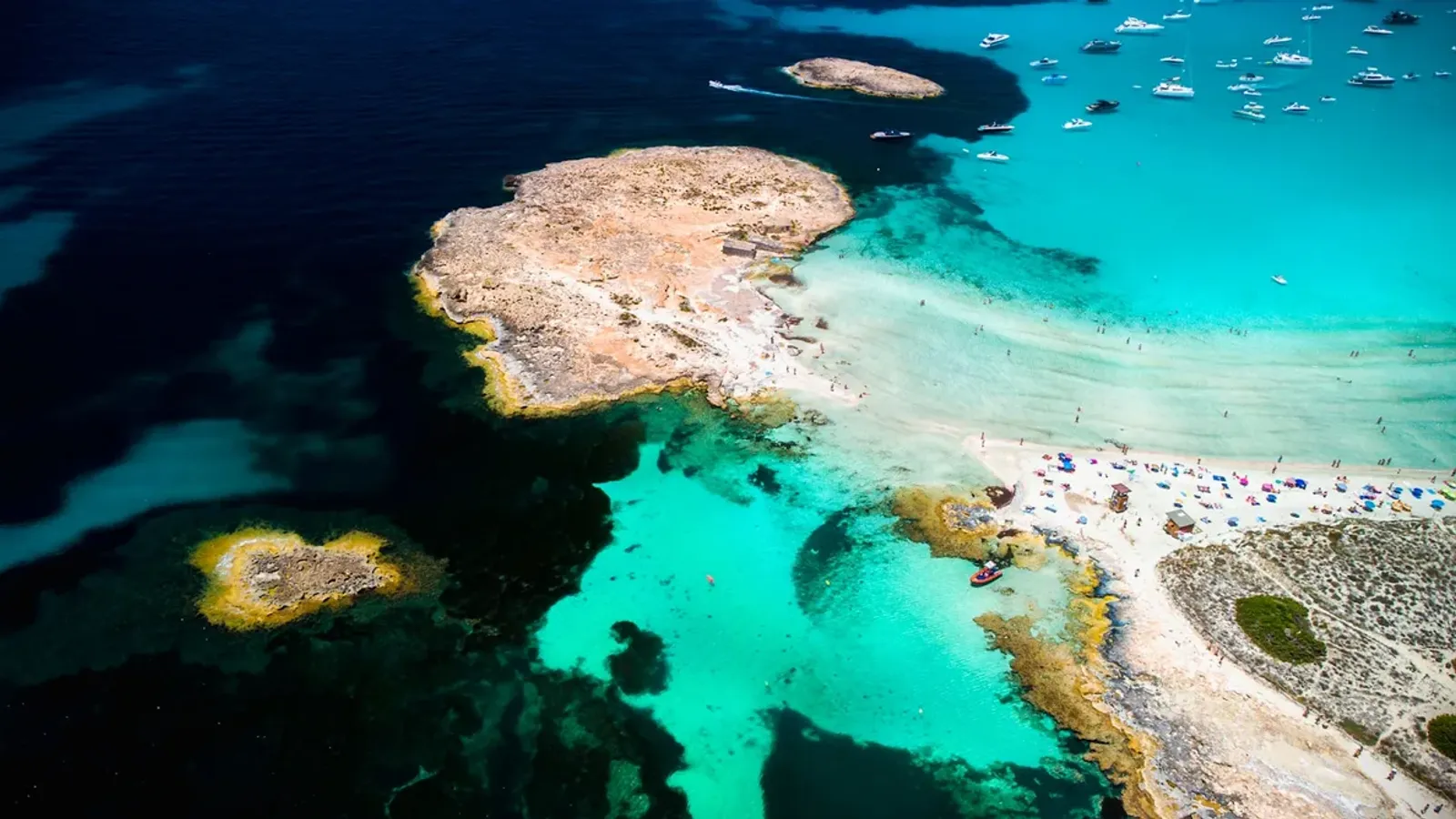 Turquoise water at Ses Illetes, Formentera, reached by boat from Ibiza